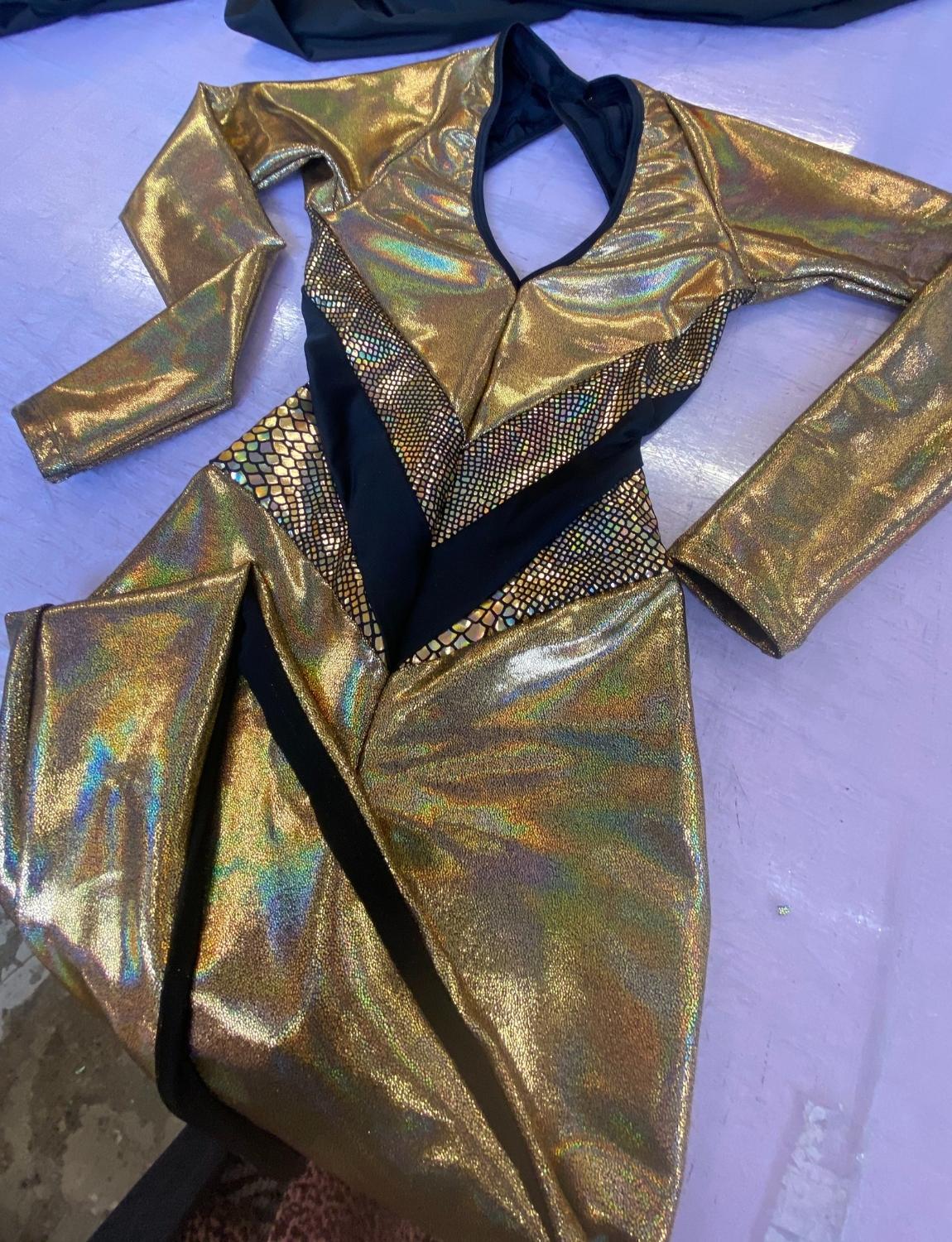 Burnt Soul custom backless catsuit in gold fabric