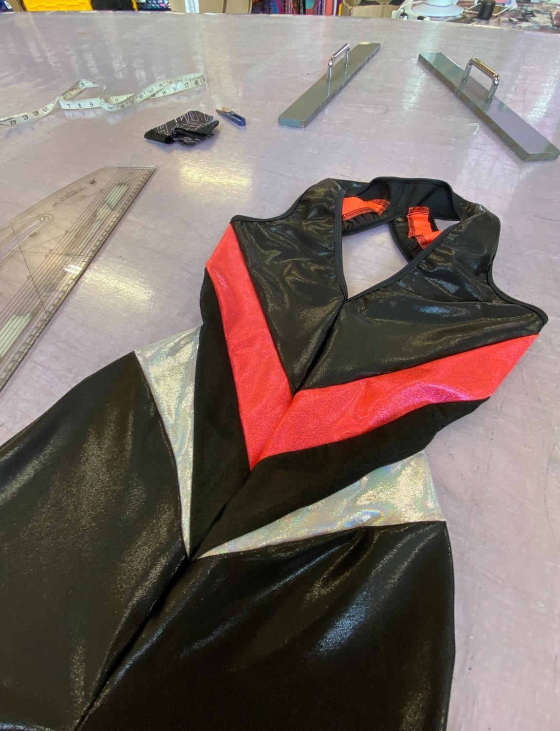 Burnt Soul custom backless catsuit in black fabric 