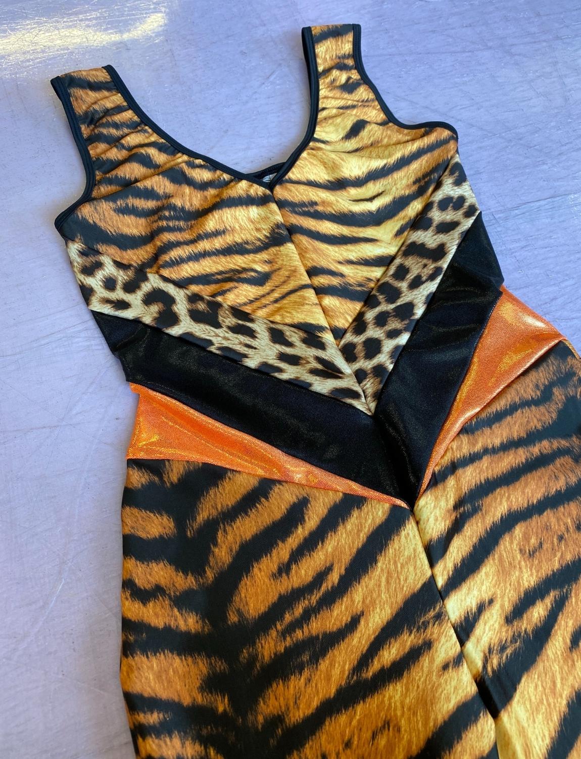 Burnt Soul custom peekaboo catsuit in tiger print 