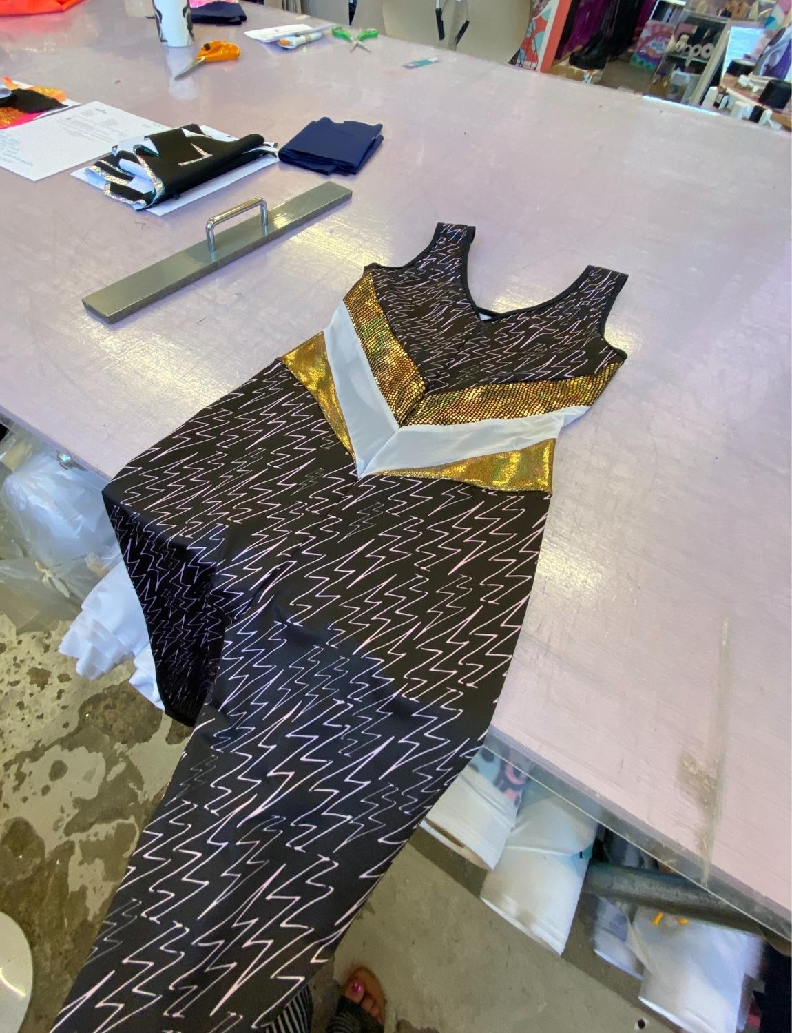 Burnt Soul custom peekaboo catsuit in lightning print fabric 