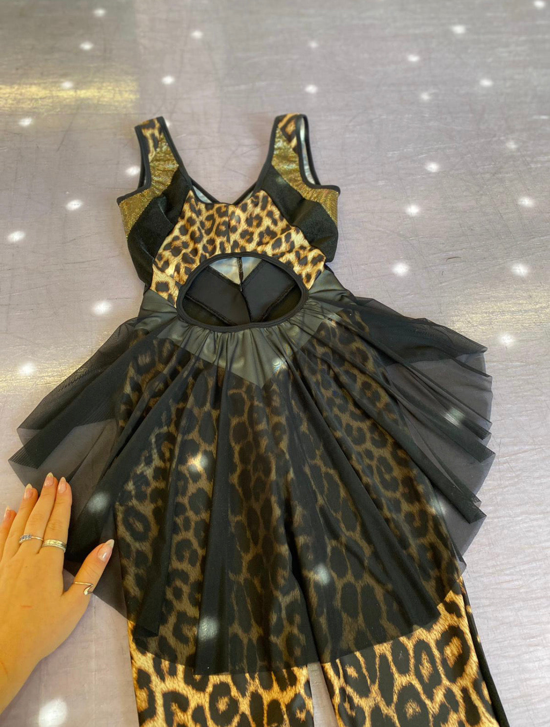 Burnt Soul custom peekaboo catsuit in leopard print fabric with black mesh skirt 