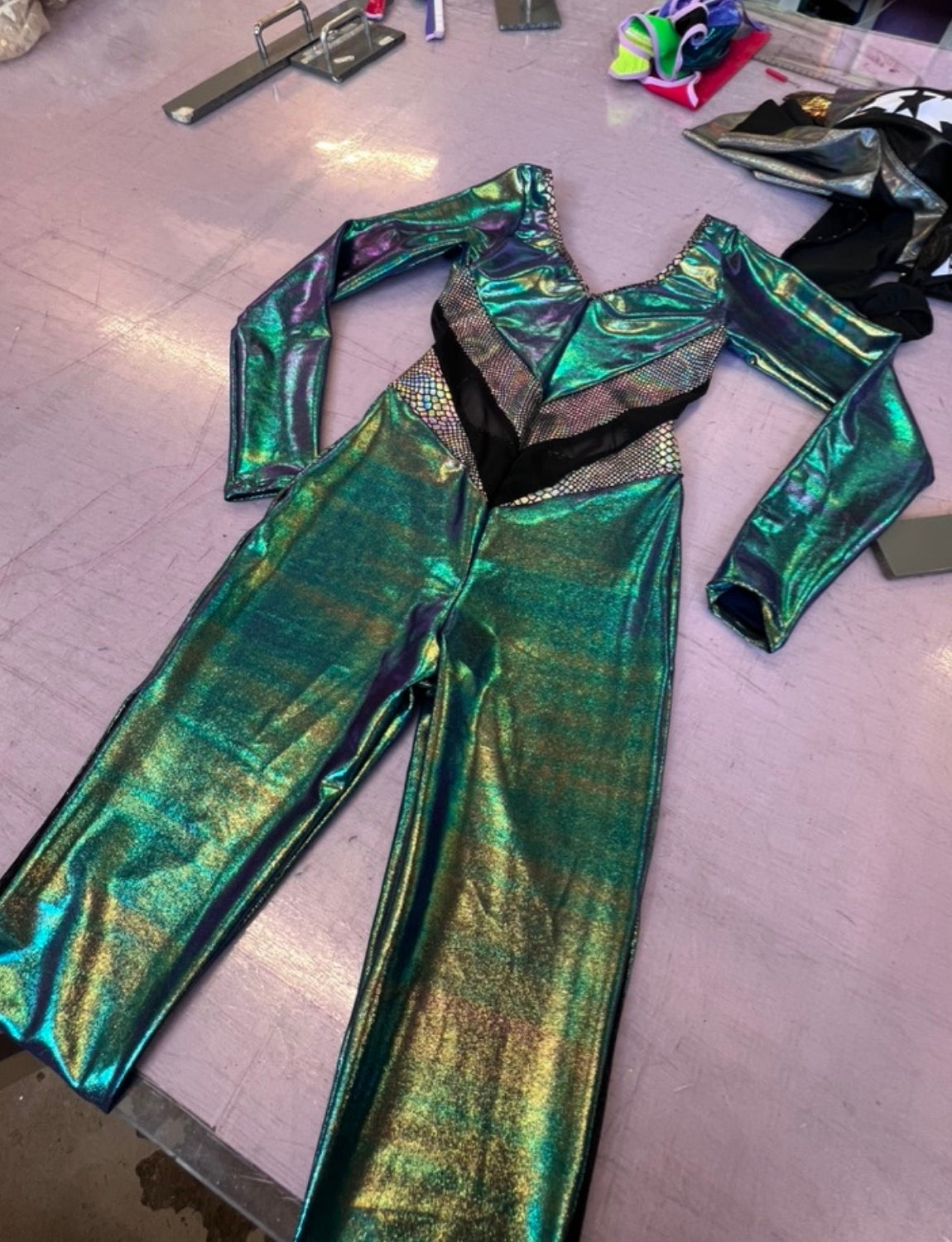 Burnt Soul custom peekaboo catsuit in amazon fabric with sleeves 