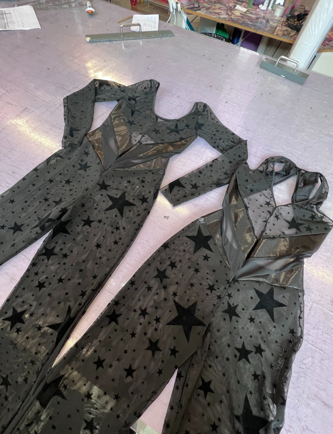 Burnt soul custom peekaboo catsuit in star mesh fabric 